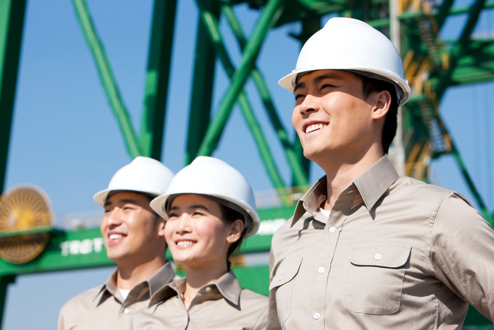 Chinese shipping industry workers looking in the distance